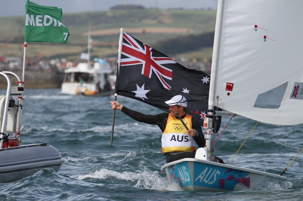 Tom Slingsby victorious  - August 6, 2012 - Weymouth, England  © Richard Gladwell www.photosport.co.nz